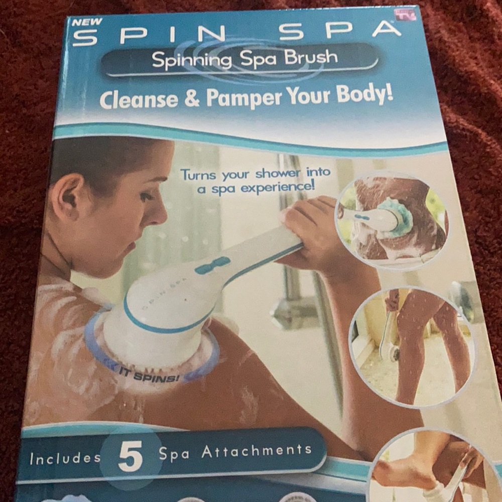 Spin Spa spinning spa brush with 5 attachments. Brand new. Never opened.